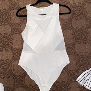White bodysuit with mesh cutouts